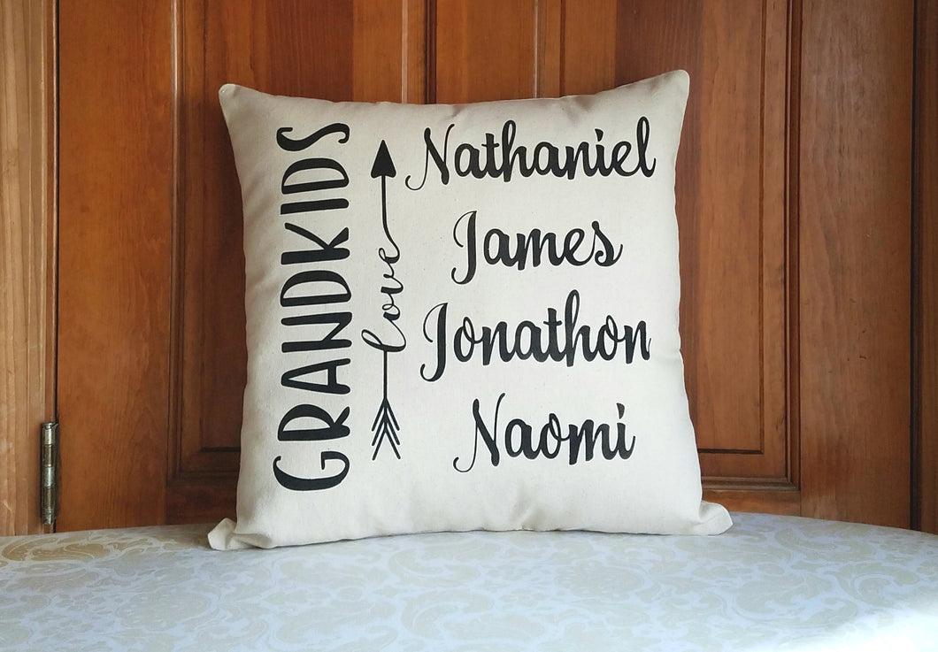 customizable grandkids name pillow for grandparents leaning against a wooden door