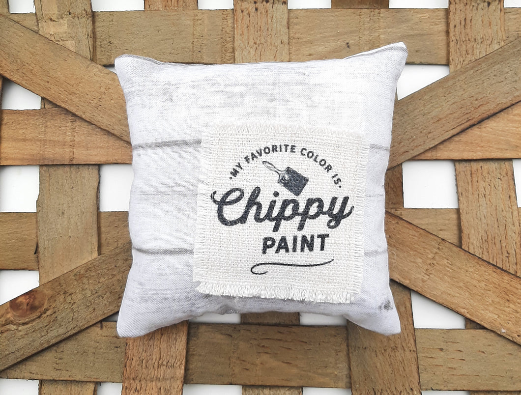 My Favorite Color is Chippy Paint Mini Pillow against a woven basket background