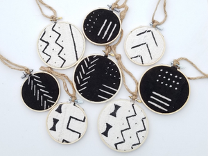 black and white African Mudcloth ornaments on a white background