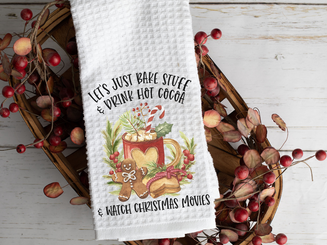 Let's Just Bake Stuff, Drink Hot Cocoa and Watch Christmas Movies Tea Towel, laying across a woven basket with berries 