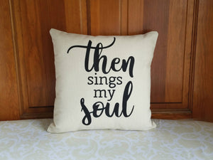 Then sings my soul pillow leaning against a wooden wall