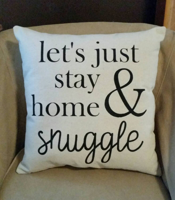 Let's just stay home and snuggle Accent Pillow sitting on a couch 